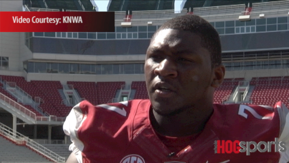 Arkansas coach John L. Smith and offensive lineman Jason Peacock talk about Peacock's work to move past an off-season arrest for theft of property. 