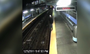 Surveillance video obtained by The Associated Press in Philadelphia shows a man walking right off a train platform and falling onto tracks while messing with his cell phone.