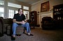 Mark Cloud sits in his personal space in his Springdale home.