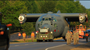 A C-130 aircraft with its wings, tail and props removed moves slowly along Vandenberg Boulevard outside of the Little Rock Air Force Base Sunday morning in Jacksonville.  The plane was heading for retirement as a static display at the Jacksonville-Little Rock Air Force Base University Center.
