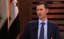 As another Syrian town buries more of its dead, President Bashar Assad takes to the airwaves Wednesday, Aug. 29, 2012, to declare that his forces need to be given time to win the country&#x27;s civil war. 