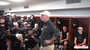 Bentonville head coach Barry Lunney, Sr., addresses his team in the locker room following the Tigers' dramatic 24-21 win over Fayetteville in the Class 7A state championship game.