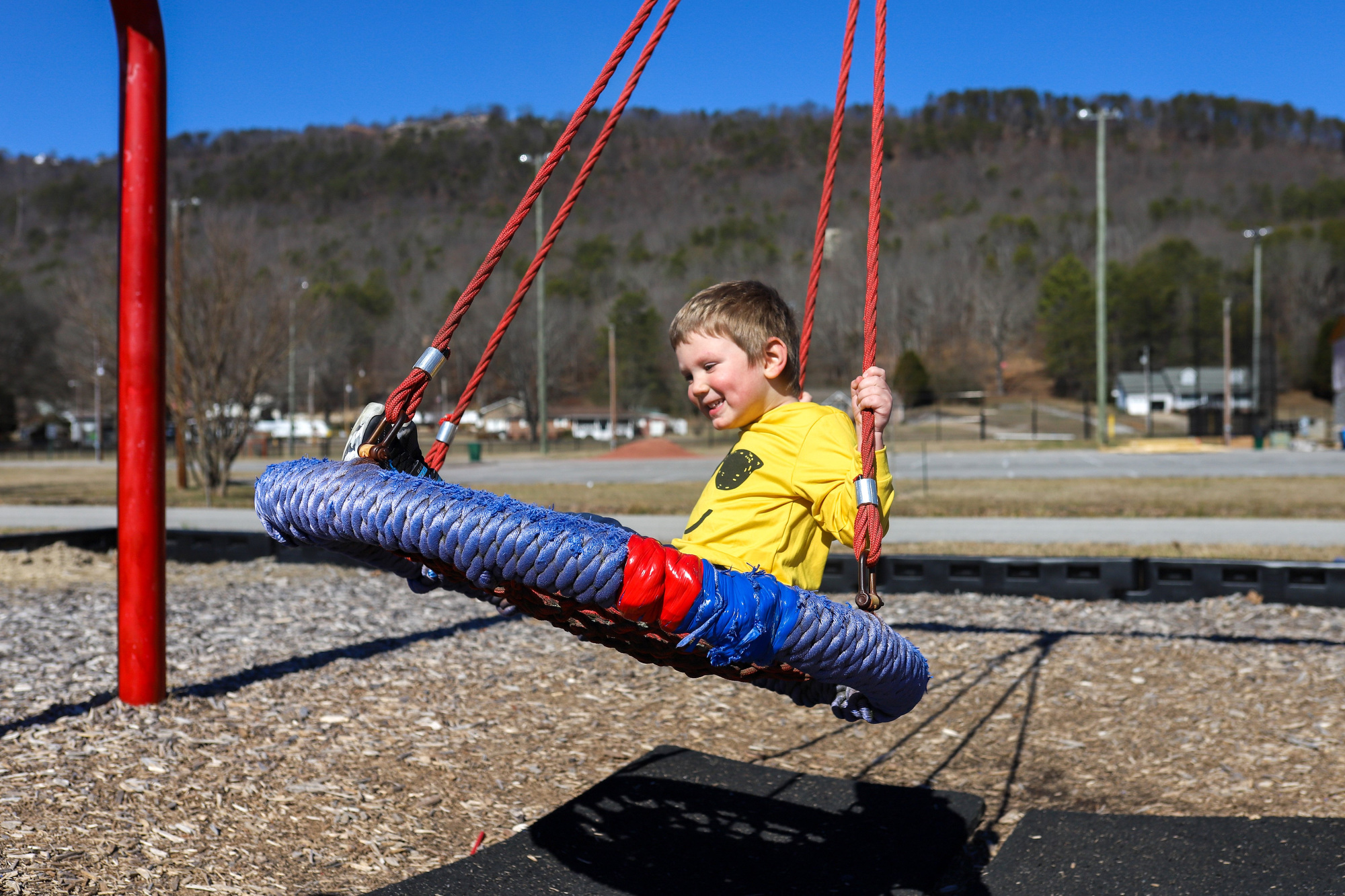Staff photo by Olivia Ross / John Parrott plays on a swing at Veterans Park in Soddy-Daisy on Tuesday, February 6, 2024.