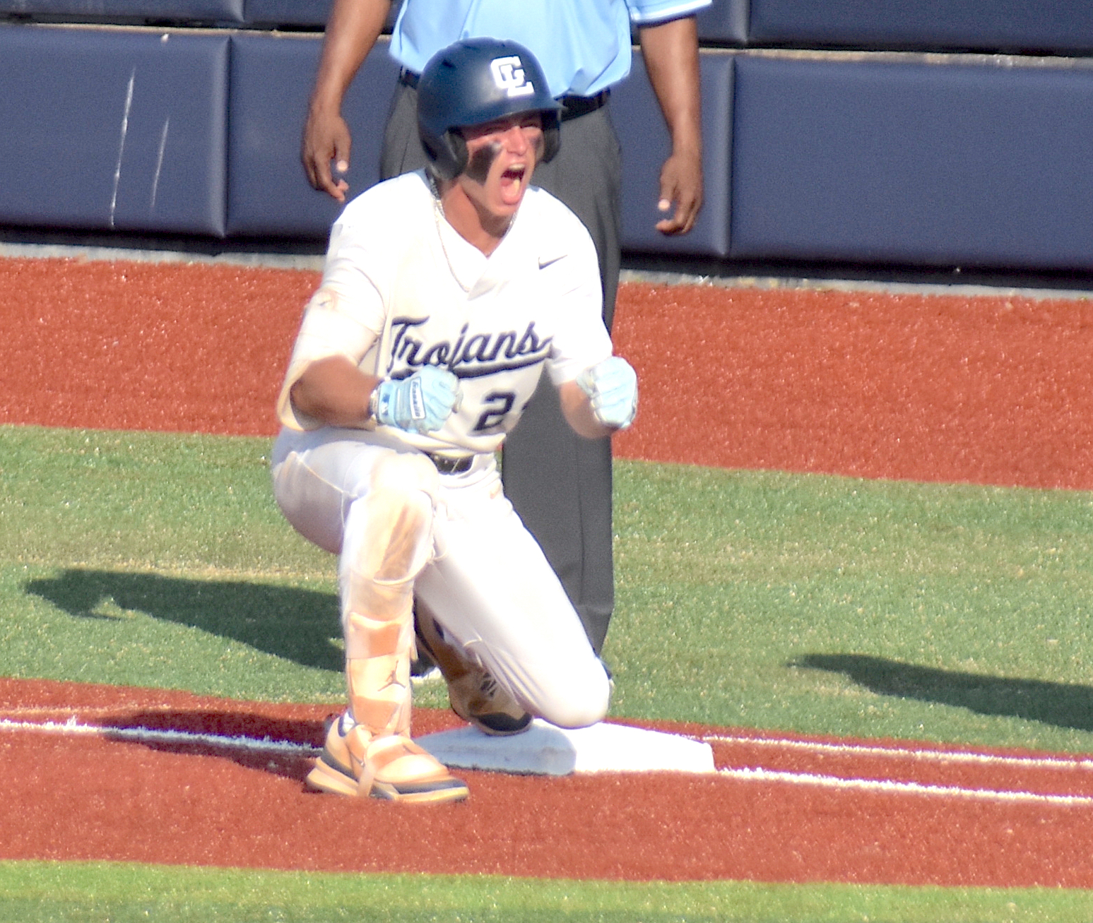 Staff photo by Patrick MacCoon / Gordon Lee sophomore Brady Little shows emotion as the Trojans' right fielder drove in three runs and had as many hits in Game 1 of the GHSA Class A Divisiiostate championship series against Pepperell on Monday at AdventHealth Stadium in Rome, Ga.