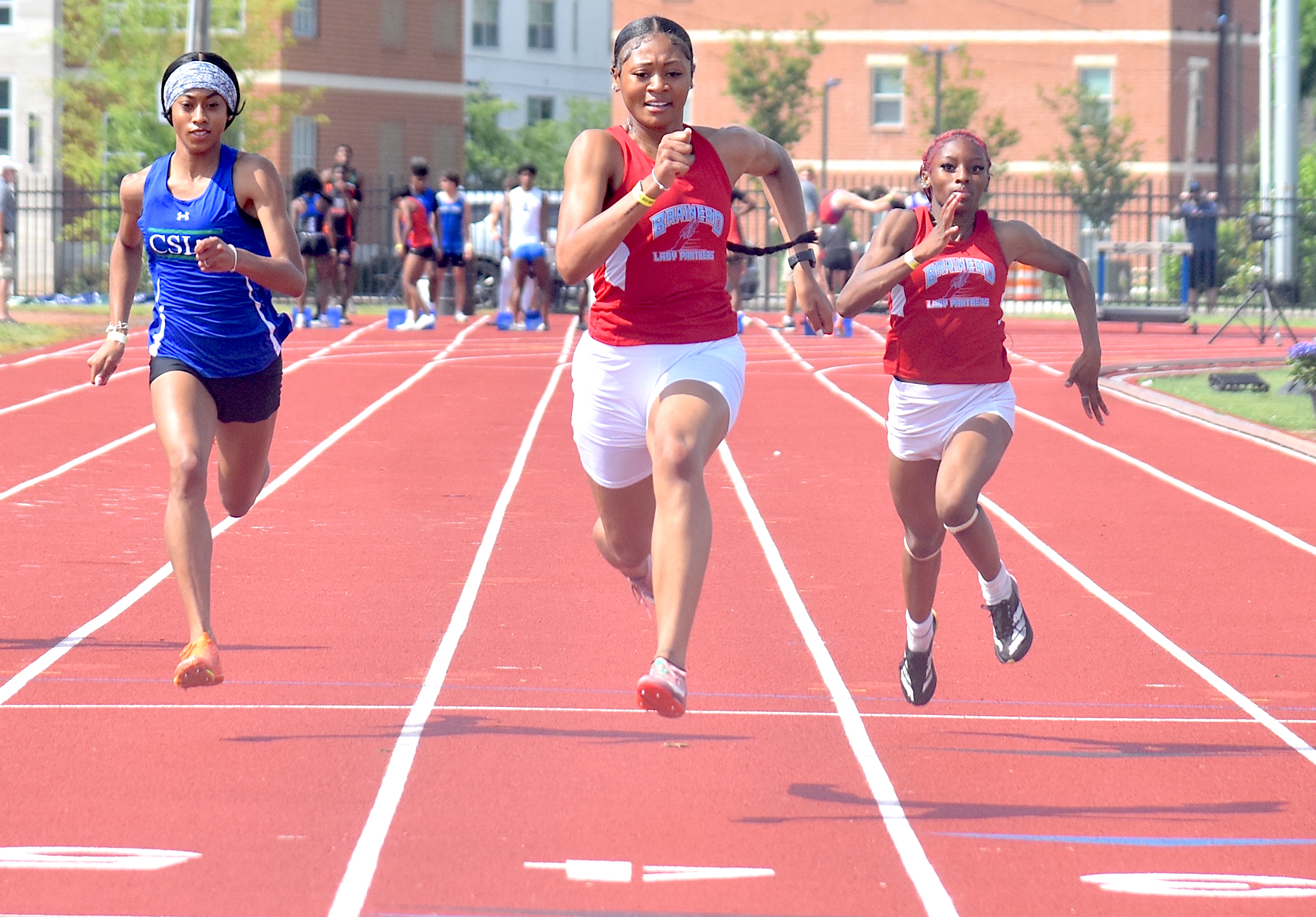 Staff photo by Patrick MacCoon / Brainerd senior Danielle Dunning wins her fourth consecutive TSSAA Class A state championship in the 100-meter dash on the first day of the Spring Fling Tuesday in Murfreesboro.
