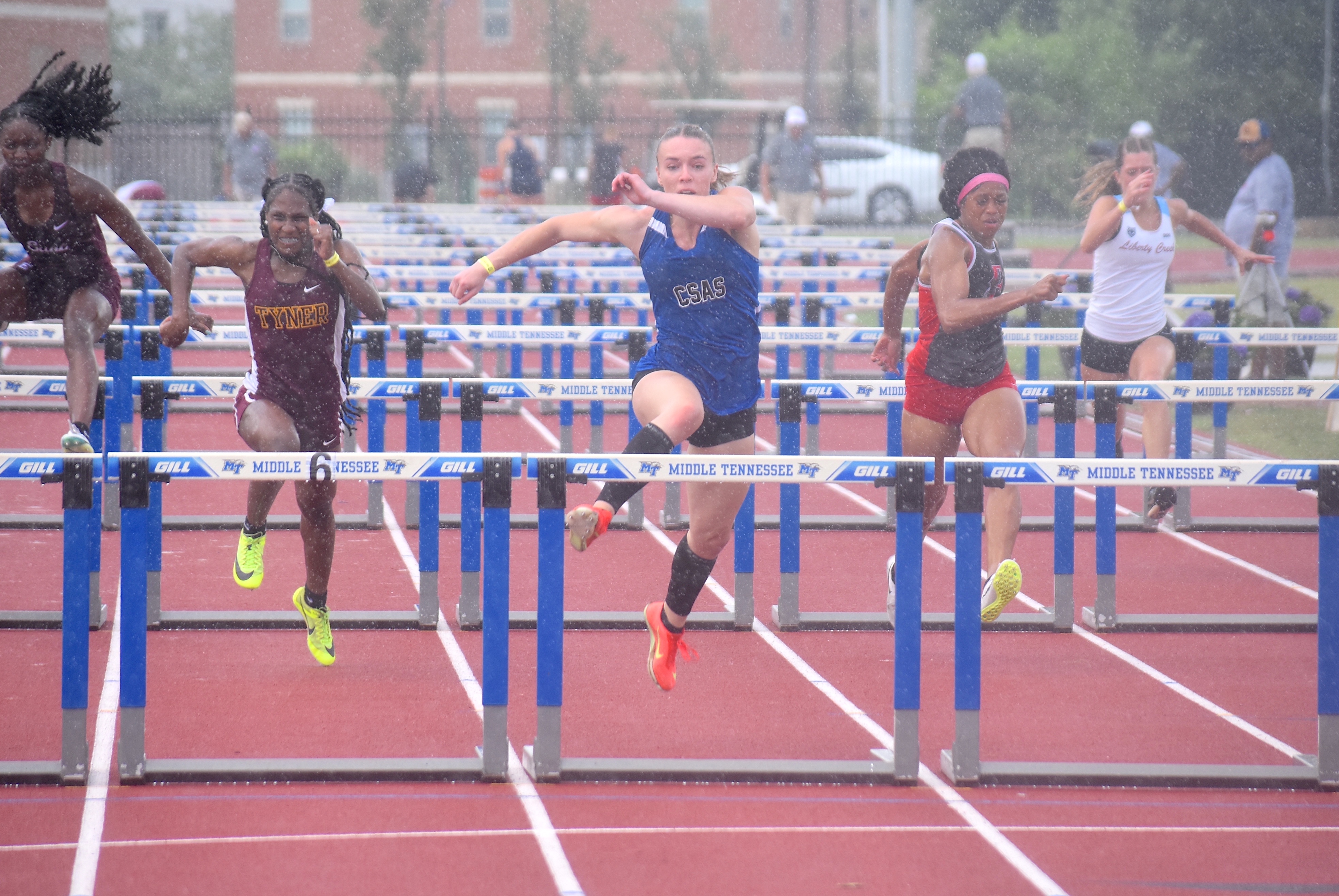 Staff photo by Patrick MacCoon / Arts & Sciences' Fiona Eastman wins a state title in the TSSAA Class A 100-meter hurdles on the first day of the Spring Fling Tuesday in Murfreesboro.