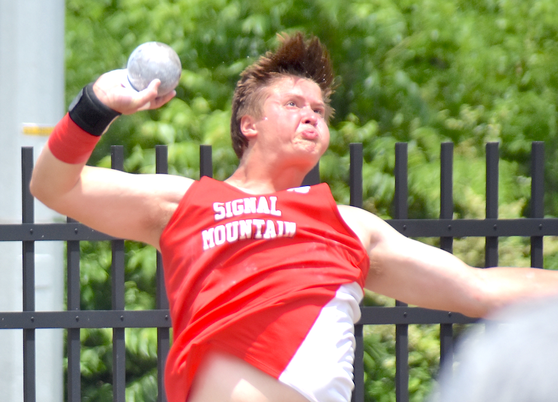 Staff photo by Patrick MacCoon / Signal Mountain junior Hudson Sveadas competes in Tuesday's TSSAA Class AA boys' shot put championship event on the first day of the Spring Fling in Murfreesboro.
