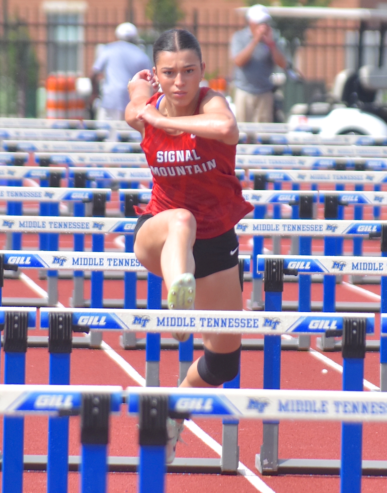 Staff photo by Patrick MacCoon / Signal Mountain's Marlee Burkley wins a state championship in the TSSAA Class A 100-meter hurdles on the first day of the Spring Fling Tuesday in Murfreesboro.