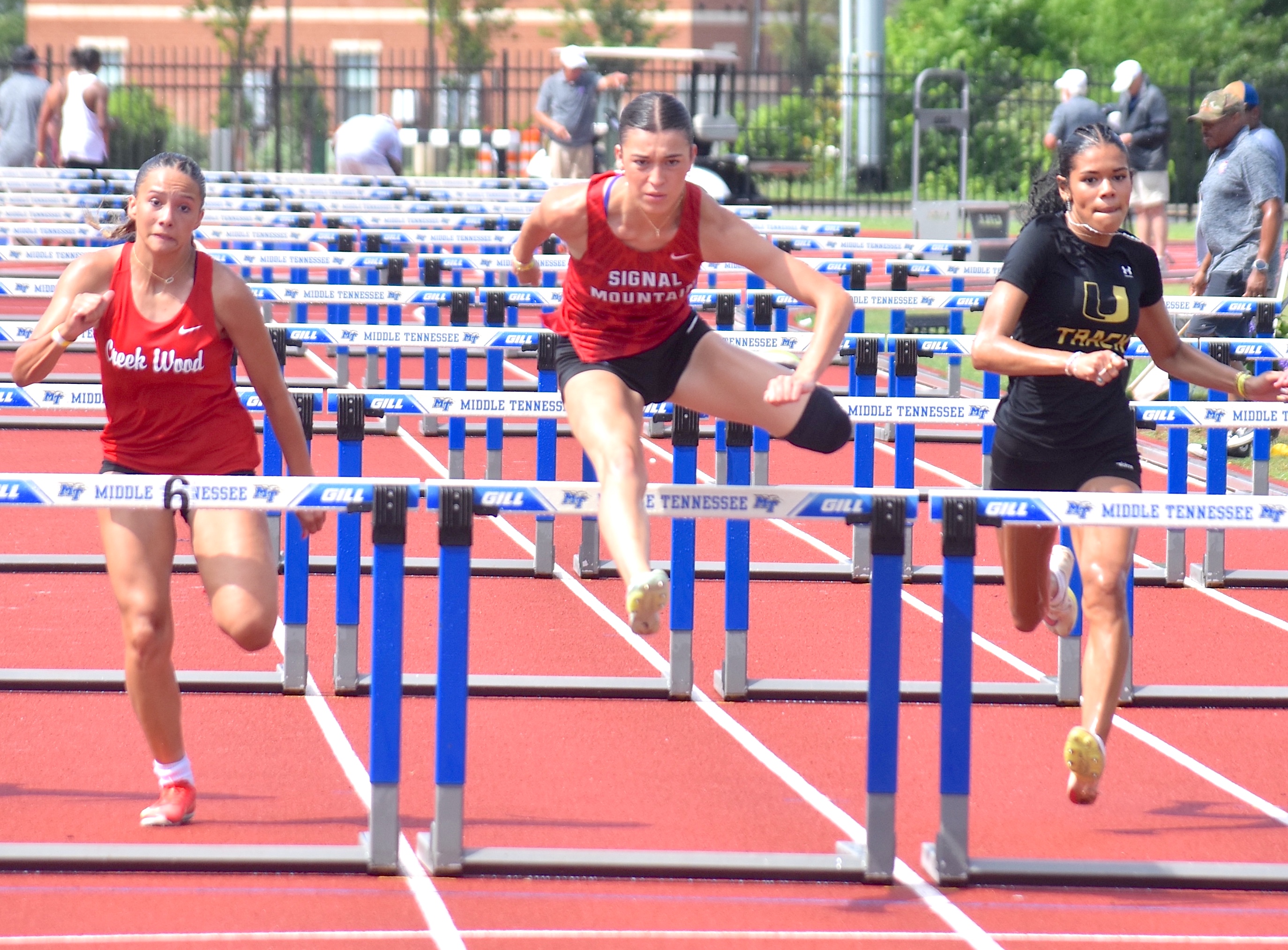 Staff photo by Patrick MacCoon / Signal Mountain's Marlee Burkley wins a state championship in the TSSAA Class A 100-meter hurdles on the first day of the Spring Fling Tuesday in Murfreesboro.