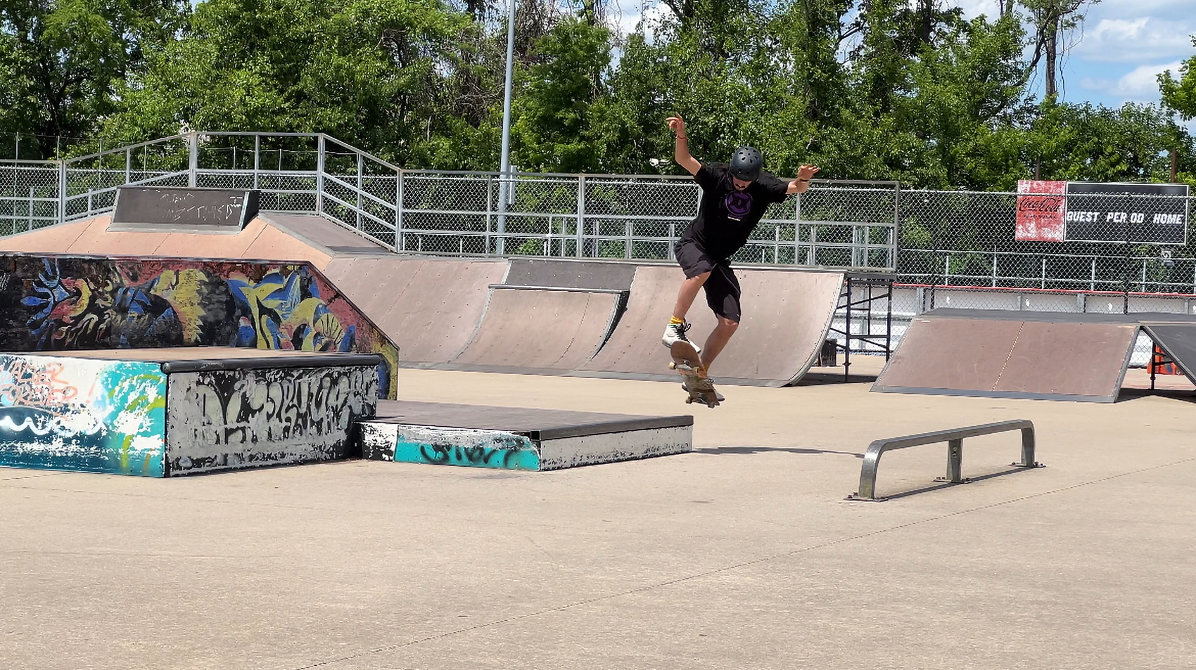 Staff photo by Cassandra Castillo / Logan Lewis attempts skate tricks at the Chattanooga Skate Park on May 5, 2025. The park renovation has been postponed for the second time, drawing concerns from the skater community.