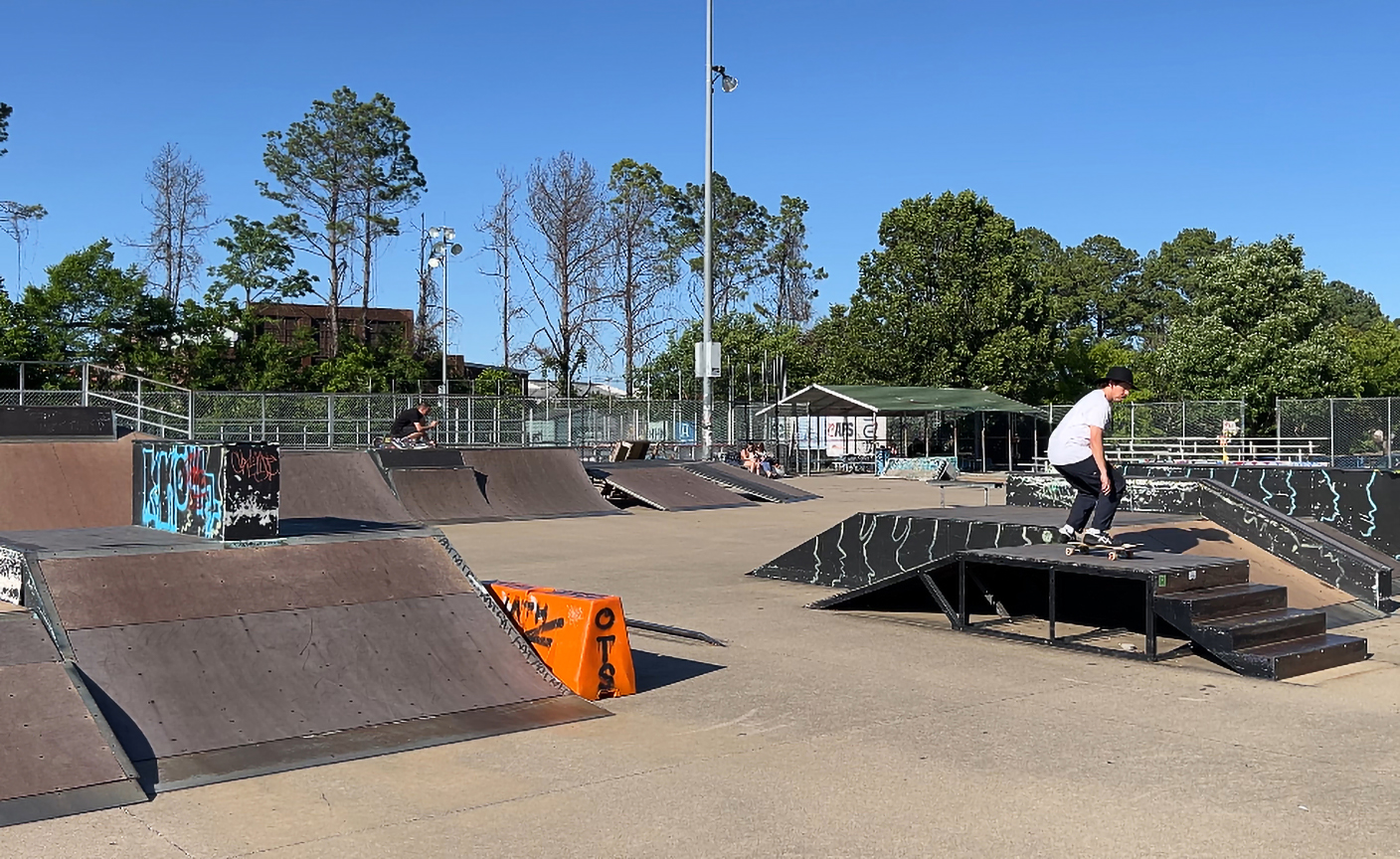 Staff photo by Cassandra Castillo / A skater prepares to land down a set of stairs on May 5, 2025. The Chattanooga Skate Park renovation has been postponed for the second time, drawing concerns from the skater community.