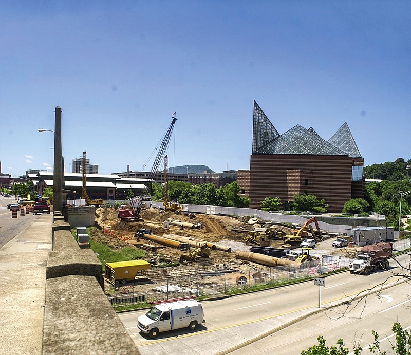 Staff file photo / The Riverfront Parkway and a walkway underneath the road leading to the river between the Chief John Ross Bridge and the Tennessee Aquarium are under construction here in 2003.