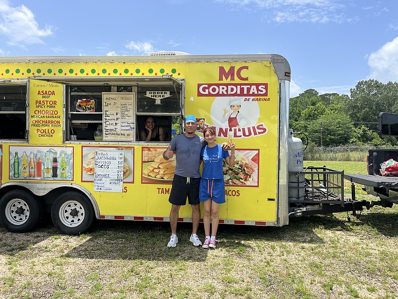 Ernesto Dovar is outside his food truck. (Photo of Keturah Smith)