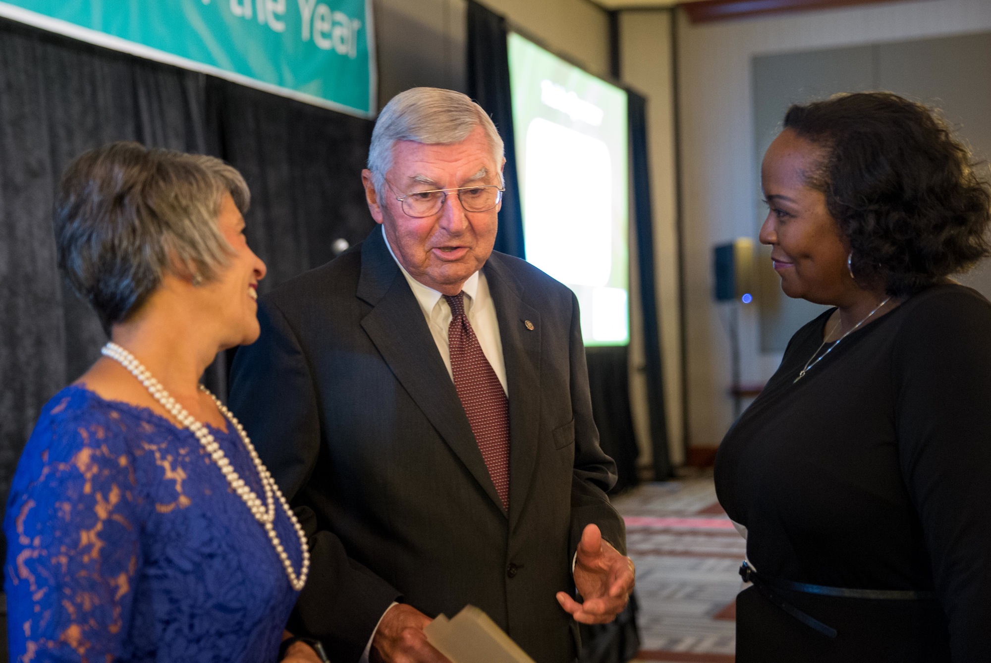 Staff Photo / Then-Chair of the EPB board and winner of the Chattanooga Area Manager of the Year Joe Ferguson talks with Julie Baumgardner and Nel Reid before the start of the awards ceremony that took place in 2018 at The Chattanoogan. Ferguson, who served on the EPB board from 1991-2019, died June 12.
