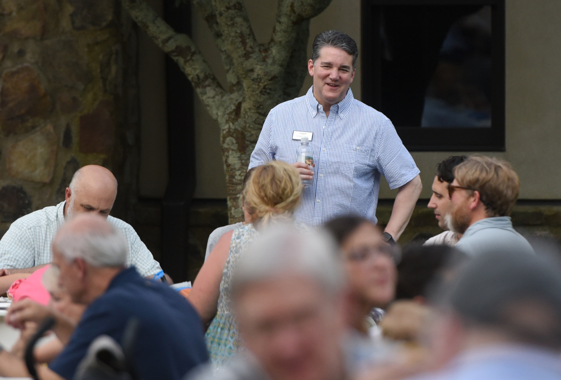 Staff photo by Matt Hamilton / School President Brad Voyles talks with visitors June 25, 2025, during an outdoor picnic at Covenant College in Lookout Mountain, Ga.