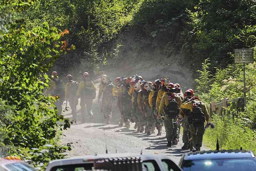 Man lured Idaho firefighters to a mountain with a fire then shot and killed 2, officials say