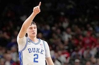 FILE - Duke forward Cooper Flagg celebrates after scoring against the Houston during the second half in the national semifinals at the Final Four of the NCAA college basketball tournament, Saturday, April 5, 2025, in San Antonio. (AP Photo/Brynn Anderson, File)