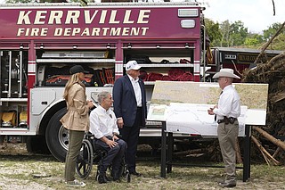 Trump tours Texas flood sites and defends officials amid mounting