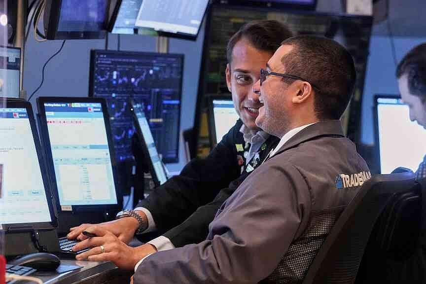 Wall Street’s winning week ends with more records for US stocks