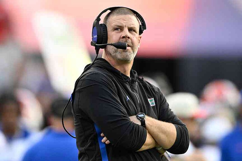 FILE - Florida head coach Billy Napier looks on from the sideline against Georgia during the first half of an NCAA college football game against Georgia, Nov. 2, 2024, in Jacksonville, Fla. (AP Photo/Phelan M. Ebenhack)
