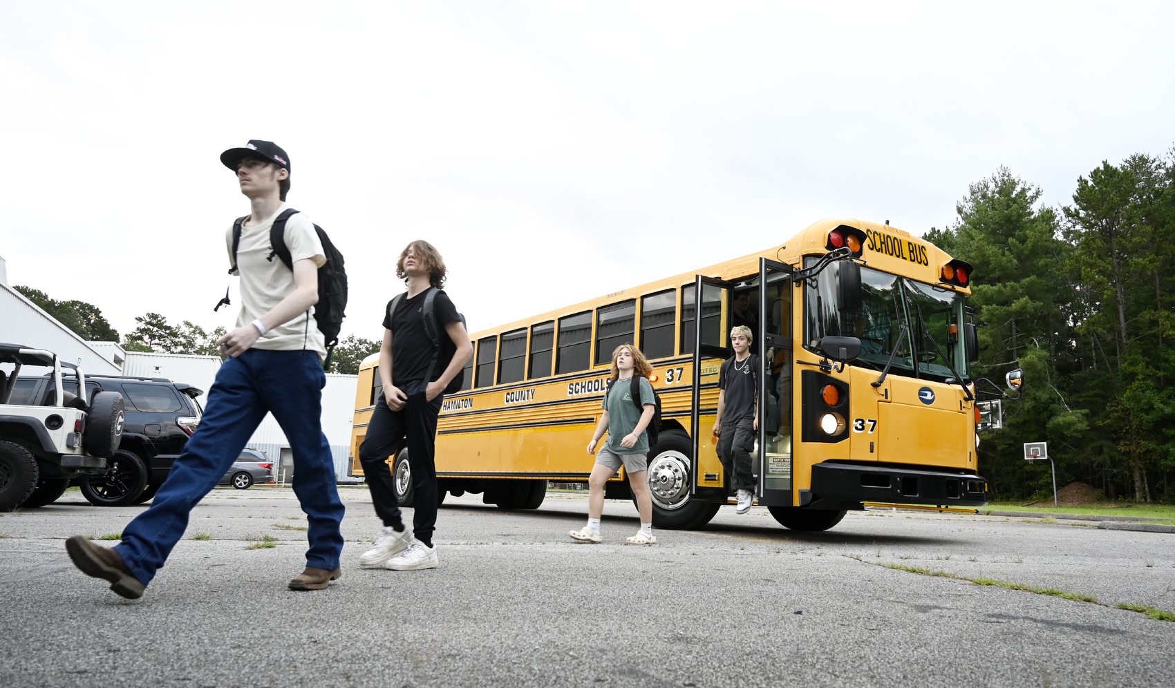 Staff photo by Abby White / North River Future Ready Center students file out of a school bus. North River Future Ready Center, formerly Sequoyah High School, held its first day of classes Aug. 6, 2025, and became the second campus in Hamilton County to become a centralized hub for career and technical education.