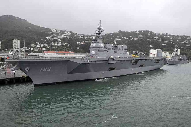 Two ships from the Japan Maritime Self-Defense Force, JS Ise and destroyer JS Suzunami tied up in the port of Wellington, New Zealand to begin a three-day ceremonial port visit, Friday, Aug. 8, 2025. (Monique Ford/Stuff via AP)