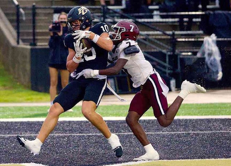 PHOTOS | Hawks, Rabbits square off to open seasons | Texarkana Gazette