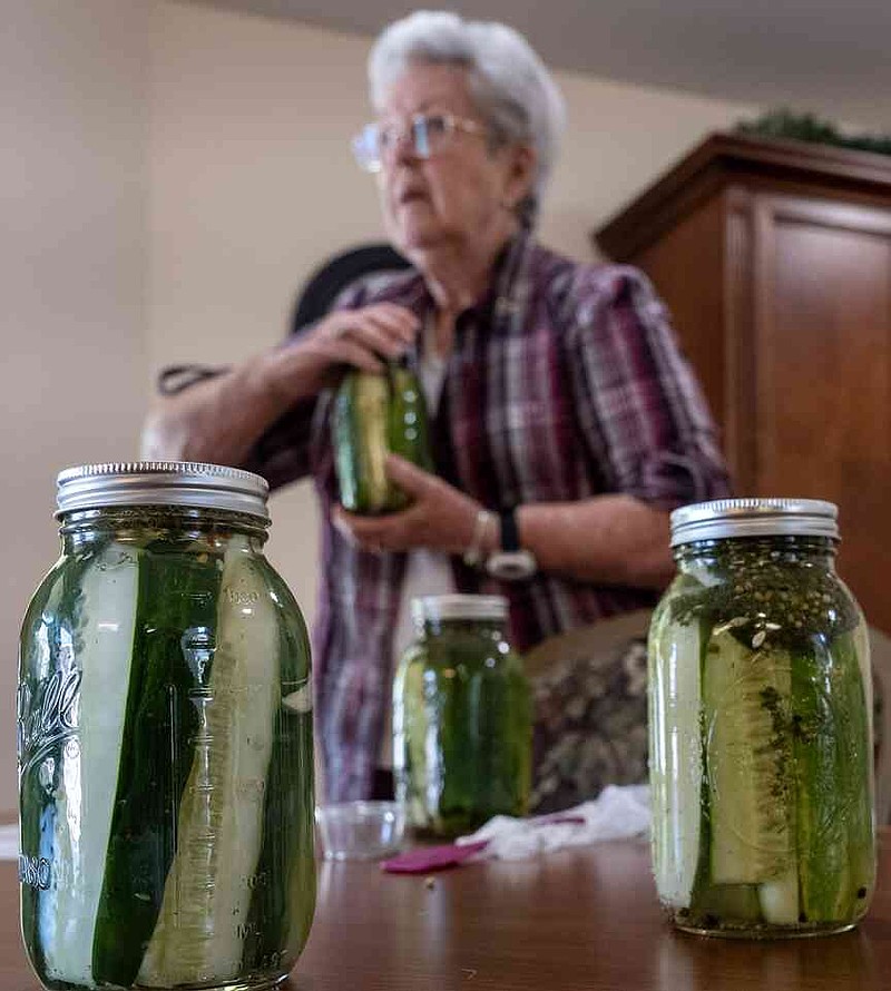 Heisinger Bluffs residents enjoy socializing while making pickles