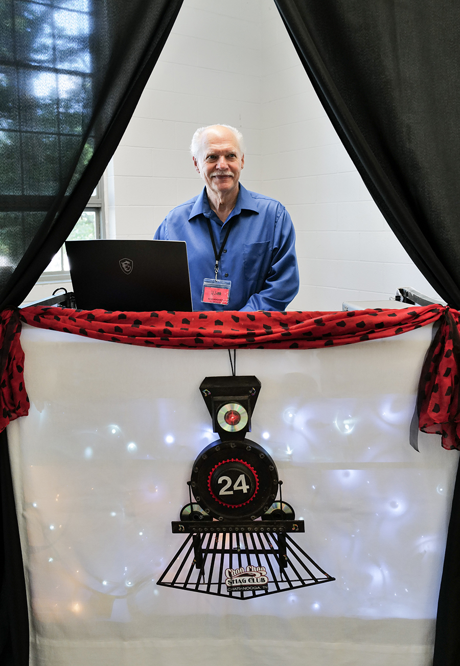 Photo by Mark Gilliland / DJ Ken Hughes providing music
