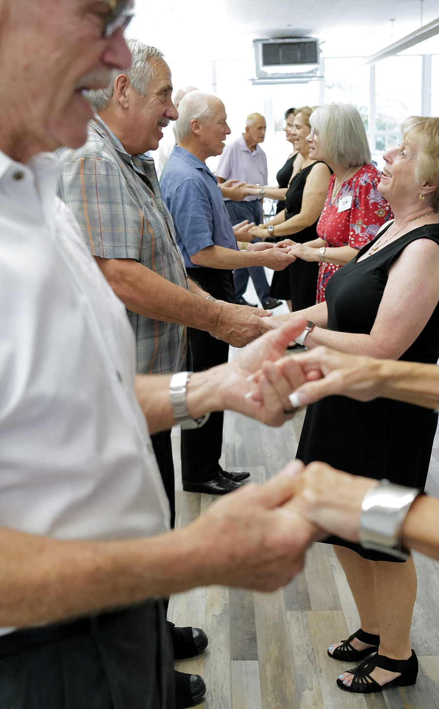 Photo by Mark Gilliland / Members of the club dancing with their partners.