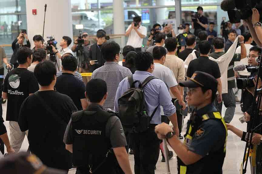 South Korean workers return home after US immigration raid