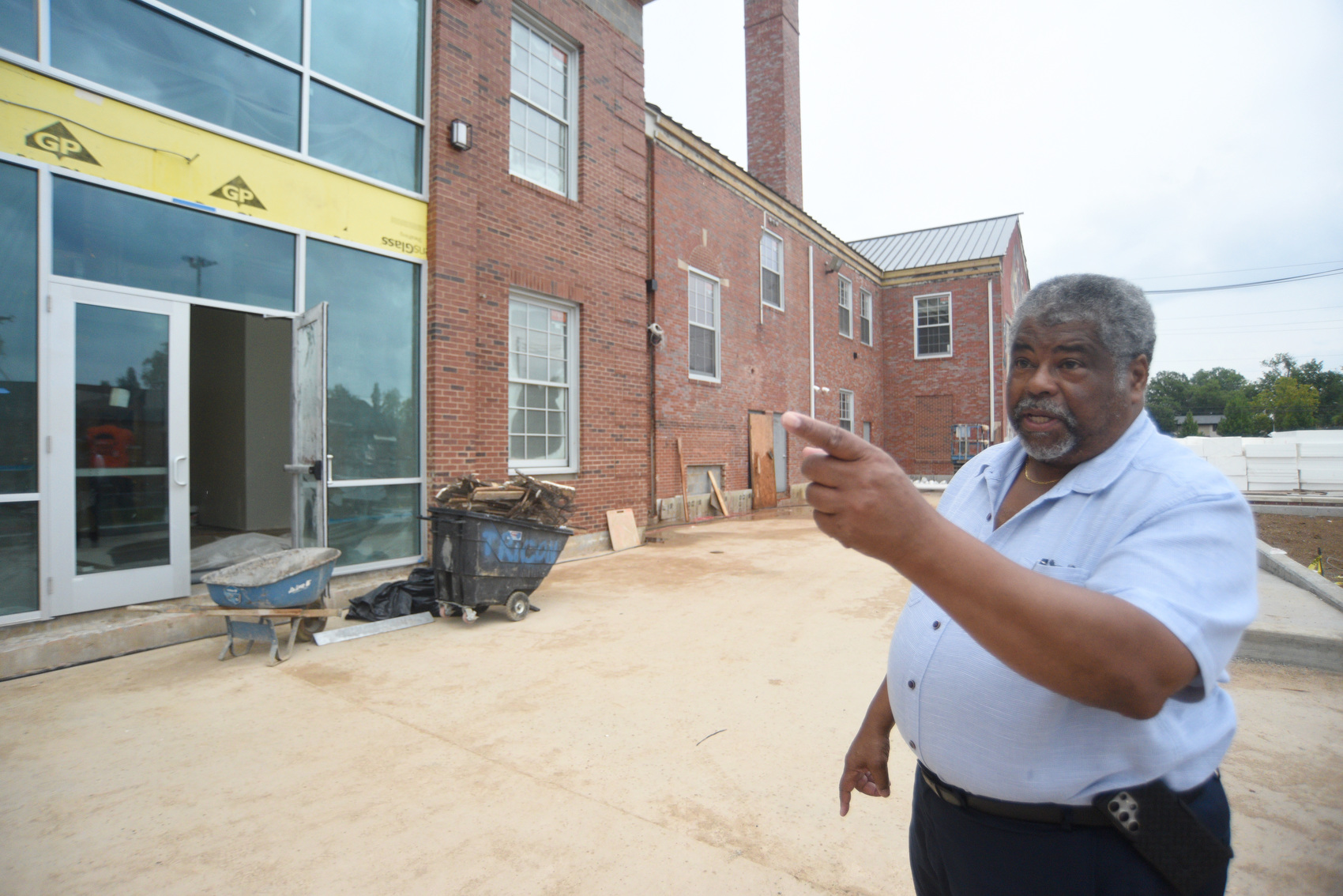 Staff photo by Matt Hamilton / Architect Reginald Ruff speaks Sept. 23, 2025, during a tour of the James A. Henry building.