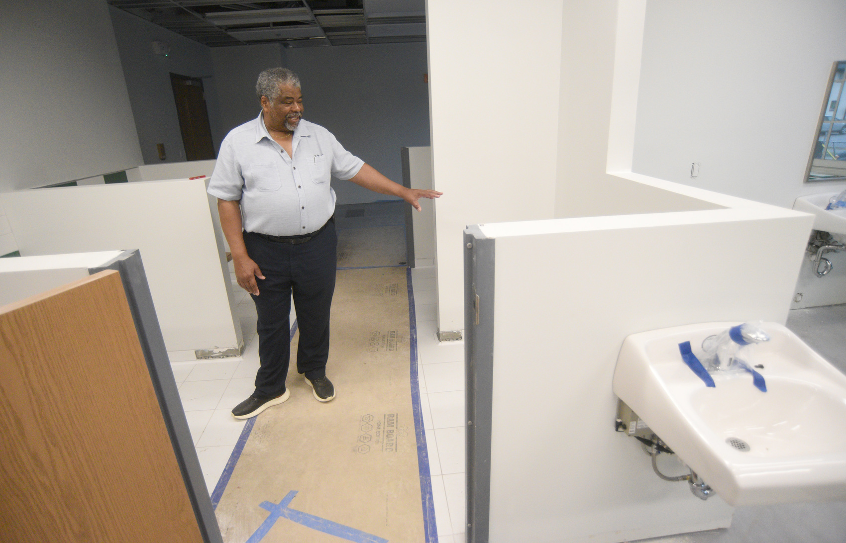 Staff photo by Matt Hamilton / Architect Reginald Ruff stands in a classroom area Sept. 23, 2025, as he leads a tour of the James A. Henry building.