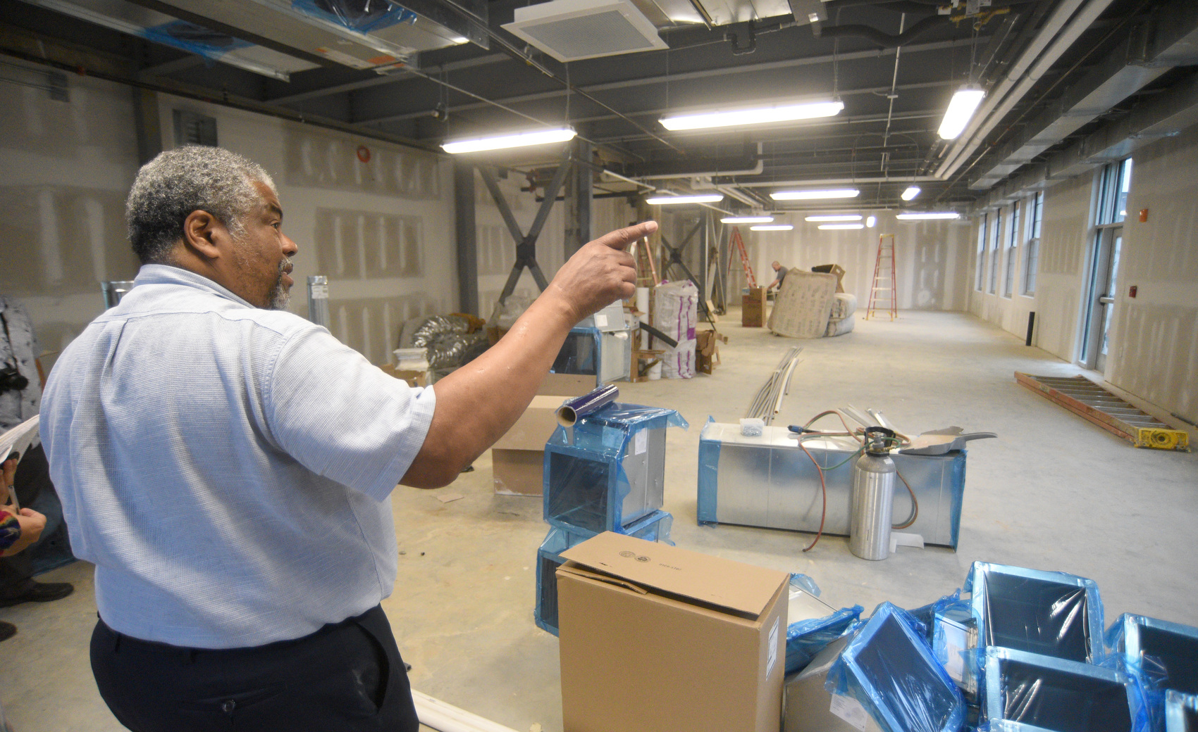 Staff photo by Matt Hamilton / Architect Reginald Ruff speaks Sept. 23, 2025, during a tour of the James A. Henry building.