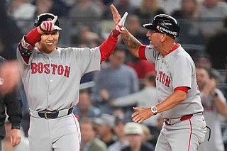 Crochet's sparkling outing lifts Red Sox over Yanks in playoff