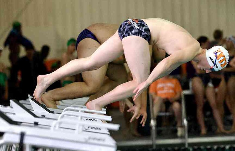Texas High School Tigershark Cason Hason dives off the blocks in a heat of the boys 200-meter freestyle at a four-school meet Saturday, Oct. 18, 2025, at the Texarkana Independent School District Aquatic Center at Texarkana College. (Staff photo by Stevon Gamble)