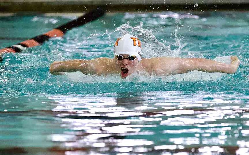 Texas High School Tigershark Coy Ward completes a second lap of the butterfly in a heat of the boys 200-meter individual medley at a four-school meet Saturday, Oct. 18, 2025, at the Texarkana Independent School District Aquatic Center at Texarkana College. (Staff photo by Stevon Gamble)