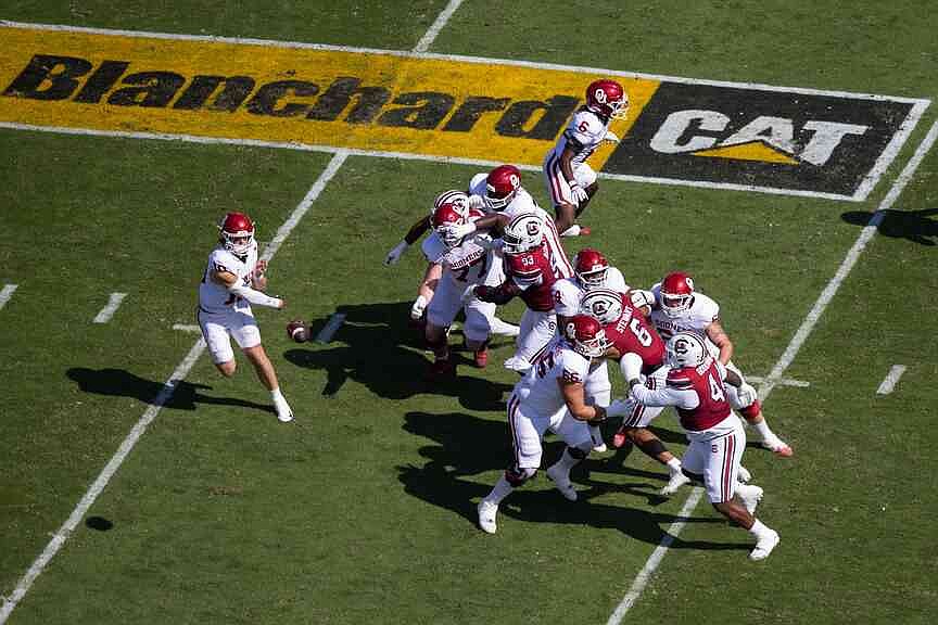 Schools adding gridiron ads to level revenue-sharing playing field