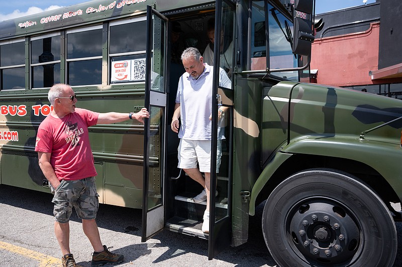 Contributed photo / A passenger exits the bus after a Redneck Comedy Bus Tour. The company is launching a Chattanooga tour in November.