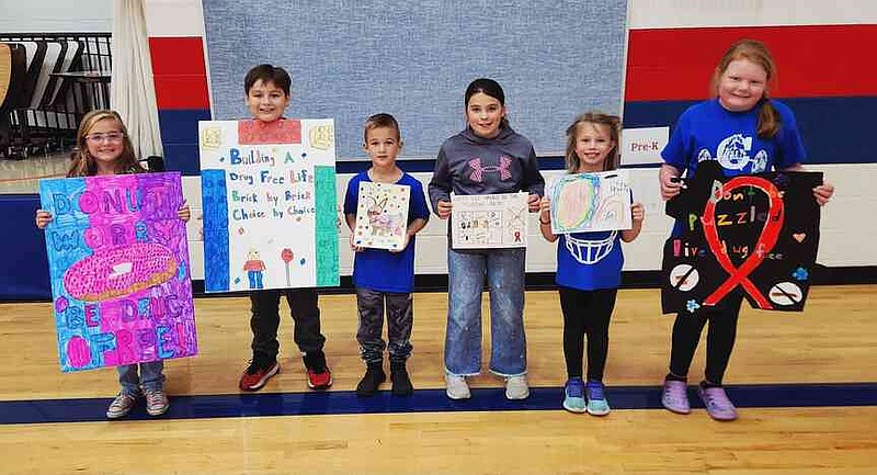 Courtesy/Ashley Benton California Elementary School students pose with their winning posters for the SRO Poster Contest. Each of the winners will enjoy a celebratory pizza party. From left to right: Kamryn Gieck, Elijah Castro, Argo Stauffer, Daphney Floyd, Jordyn Wickham, Eleanor Anderson.
