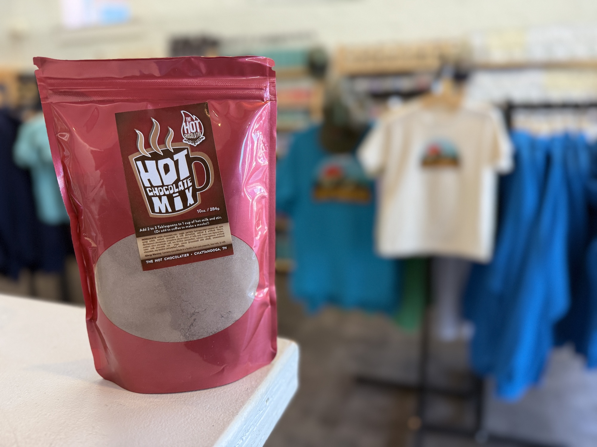 Staff photo by Sam Still / A pouch of The Hot Chocolatier's hot chocolate mix sits on the counter at Locals Only.