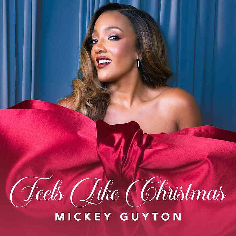 This cover image released by MCA Nashville shows "Feels Like Christmas" by Mickey Guyton. (MCA Nashville via AP)