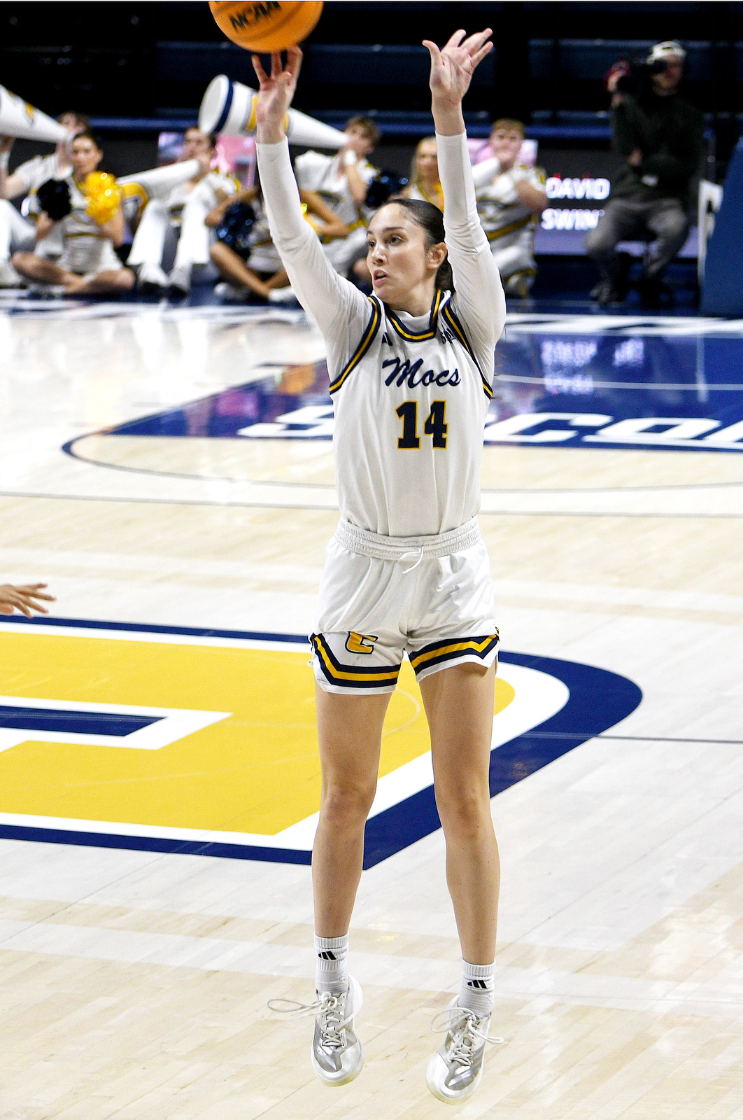 Staff Photo by Robin Rudd / UTC's Izzy McPherson (14) shoots a three-point shot. The University of Tennessee at Chattanooga Mocs hosted the Bellarmine Knights in a NCAA basketball game, at McKenzie Arena, on Dec. 7, 2025.