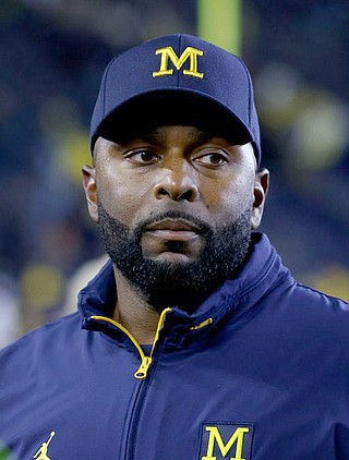 Ex-Michigan coach Sherrone Moore spent the night in jail after being ...