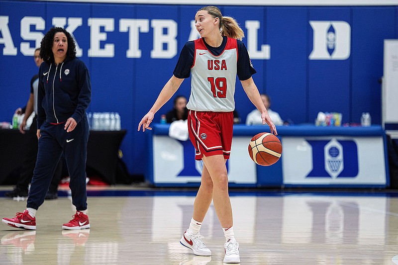 AP photo by Matt Kelley / Paige Bueckers takes part in drills during a USA Basketball camp for the senior women's program Friday at Duke University in Durham, N.C. Looking on at left is Kara Lawson, the women's basketball coach for both Duke and the U.S.