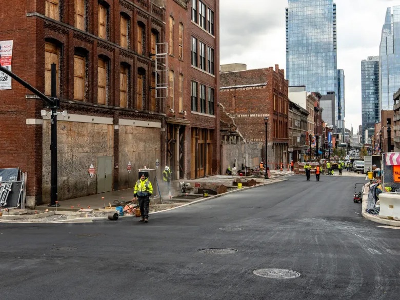 A construction crew repaves the intersection of Church Street and Second Avenue in downtown Nashville. (Martin B. Cherry/Nashville Banner)