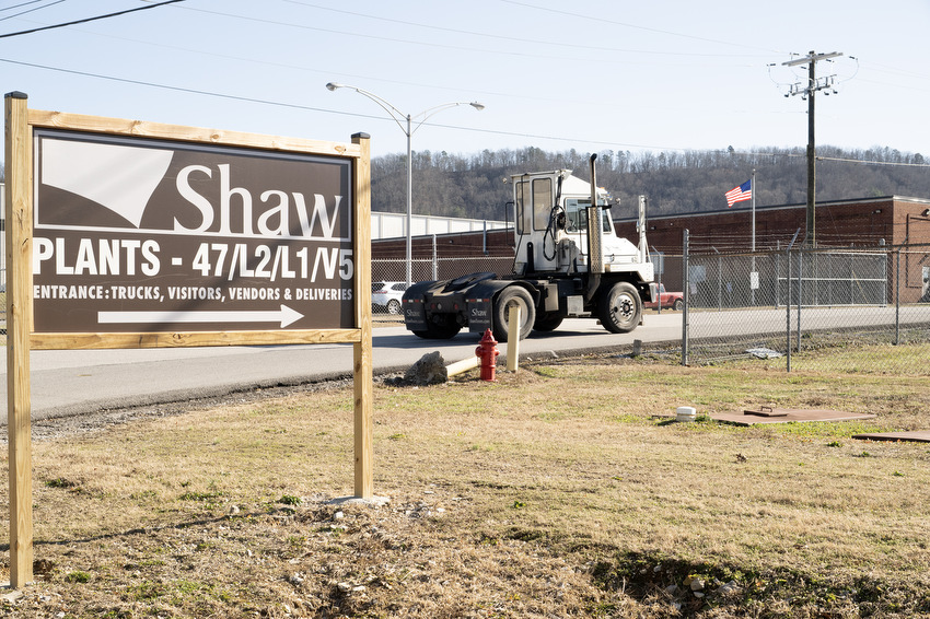 Staff Photo by Seth Carpenter/ A semi-truck enters a Shaw Industries plant in Ringgold. The company says it invented a new test to eliminate PFAS from its supply chain.