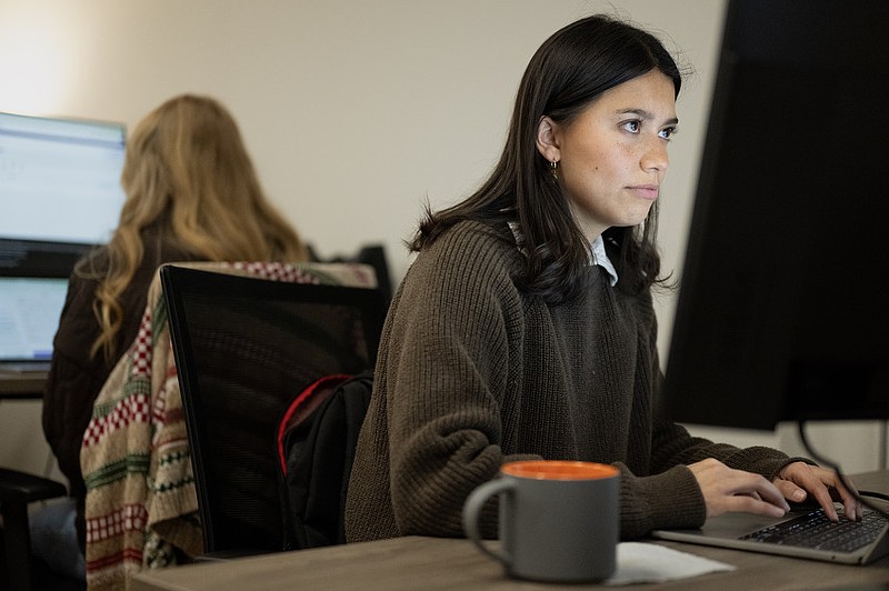 Staff photo: Seth Carpenter/ Valerie Health Operations Coordinator Erika Dela Cruz works out of Valerie Health's office space in Chattanooga, Tennessee. The company currently operates out of the Society of Work's offices at 110 Somerville Ave. on the North Shore.