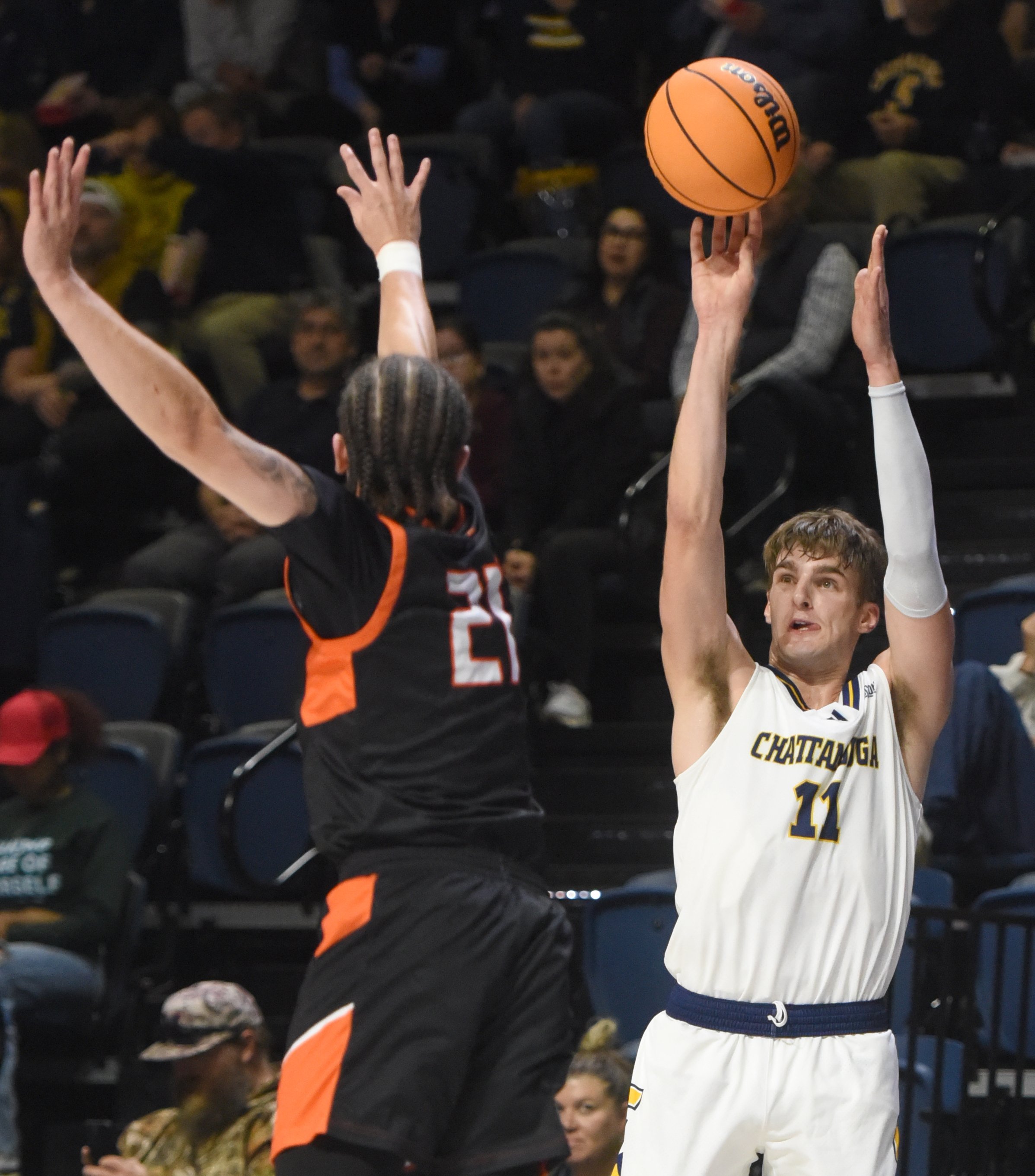 Staff File Photo by Matt Hamilton/ UTC's Billy Smith releases the ball as Union Commonwealth's Drew Rhodes defends during their game at McKenzie Arena Nov. 3.