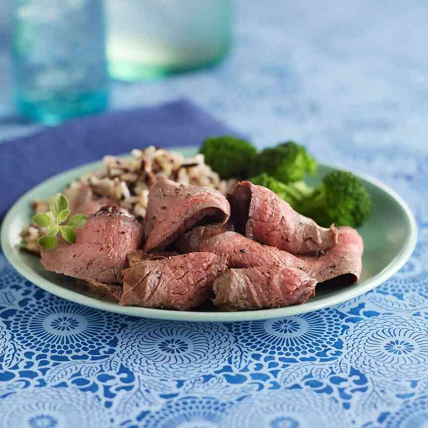 Treat house guests to wine marinated flank steak